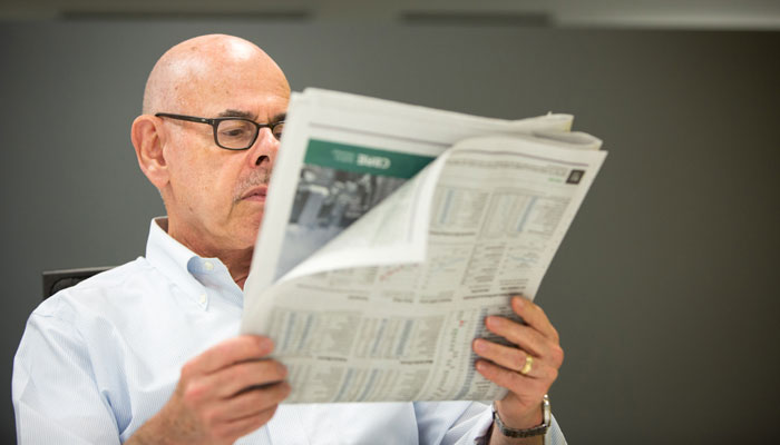 Chairman Henry Waxman Reading a Newspaper
